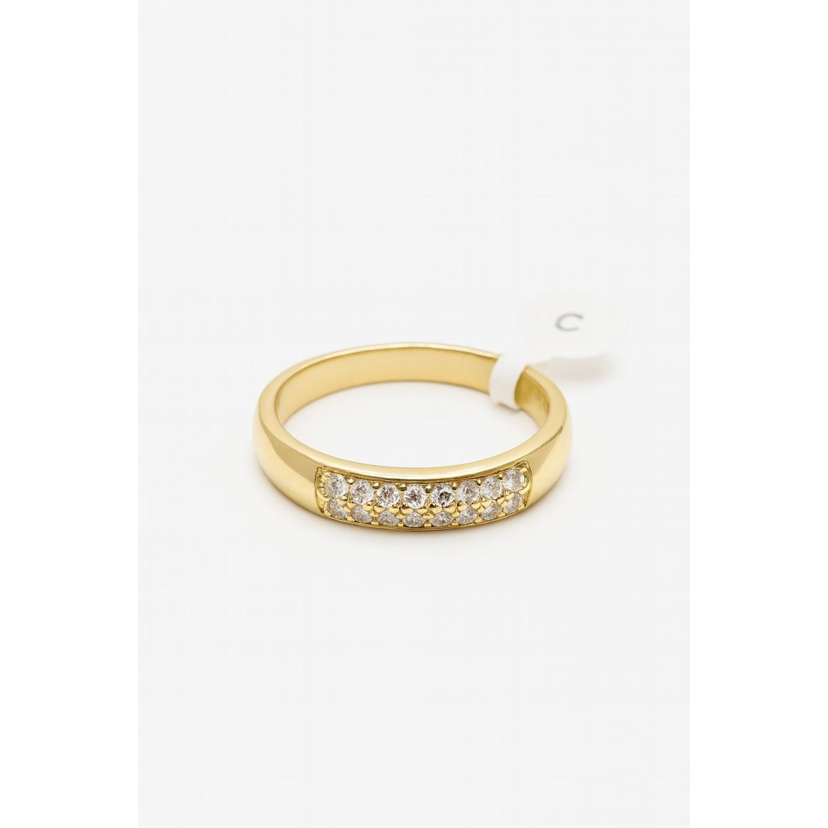 خاتم ذهبي بسيط مرصّع بزركون أبيض لامع