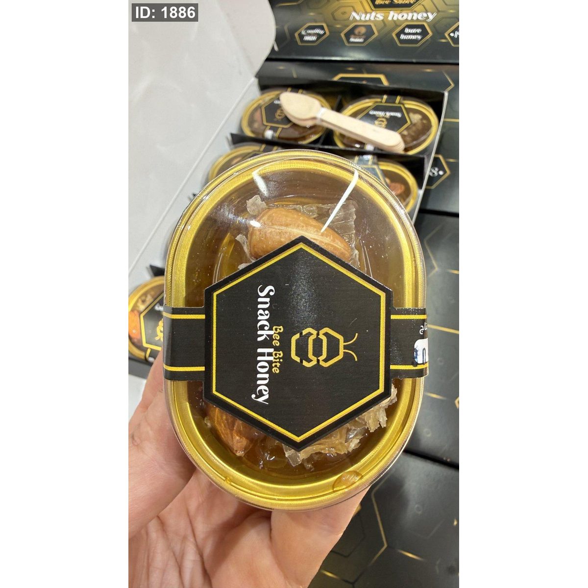 علبة عسل جبلي اصلي مع شمع العسل والمكسرات وزنها 80 غرام