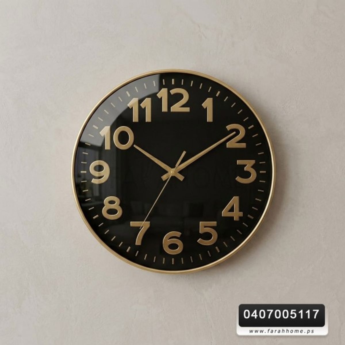 ساعة حائط لون اسود ارقام واطار ذهبي 40 سم مدور