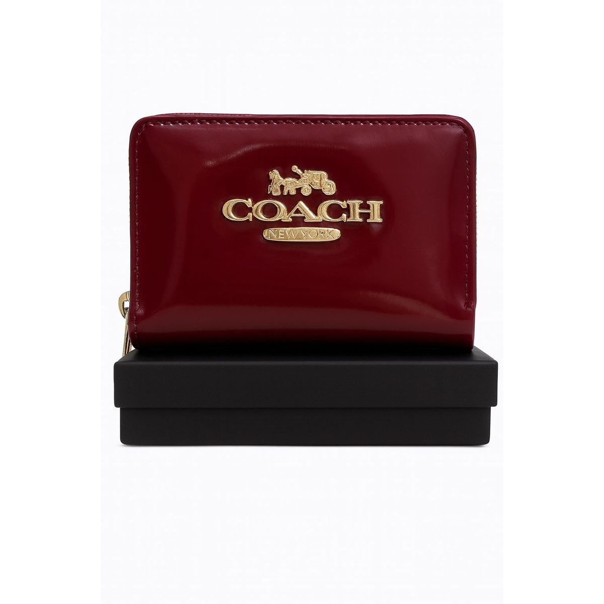 جزدان صغير من Coach بتصميم فاخر ولمسة ذهبية