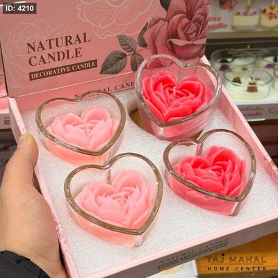 شموع معطرة على شكل وردة داخل كأس زجاجي على شكل قلب