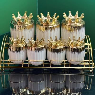 طقم سكريات بهارات 7 قطع بورسلان ابيض شكل يقطينه مع حز ذهبي وستاند