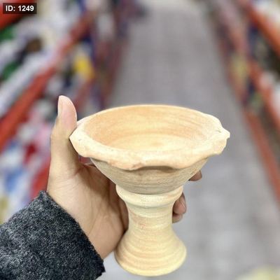 صحن فخار مع كعب عالي