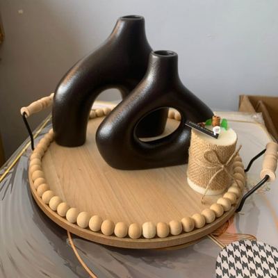 صينية خشب مدور مع حمالات معدن اسود واطار كرات صغيرة لولو 35 سم