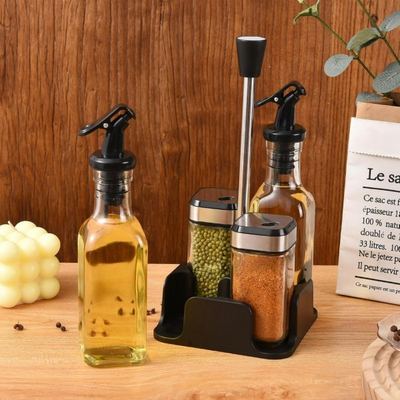 طقم علب زيت مع علب بهار مع حمالة قاعدة اسود