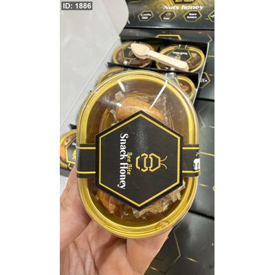 علبة عسل جبلي اصلي مع شمع العسل والمكسرات وزنها 80 غرام