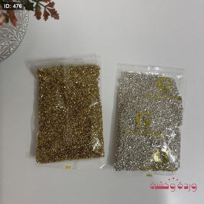 زجاج مكسر باللونين الفضي والدهبي