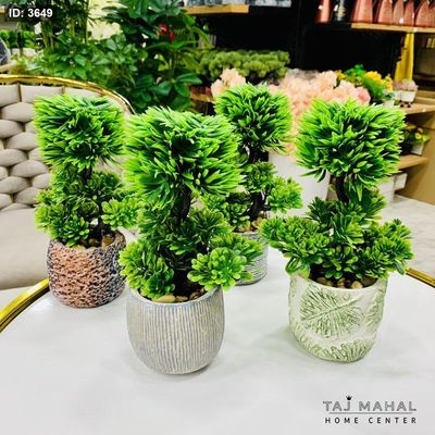 نباتات صناعية صغيرة في قوار سيراميك
