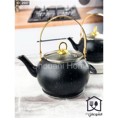 بريق شاي اسود منقط يد ذهبي