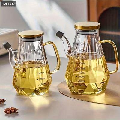 إبريق زيت زجاج مدرج بغطاء ذهبي