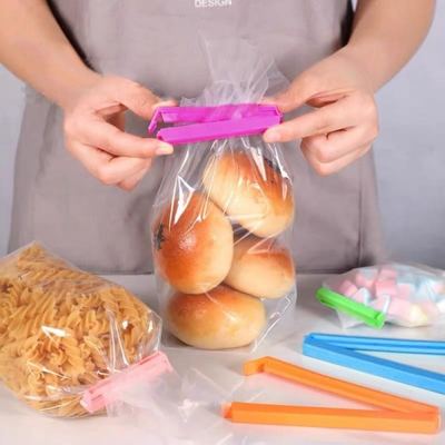 كرت ملاقط تخزين / اغلاق اكياس بلاستيك ملون 7 قطع