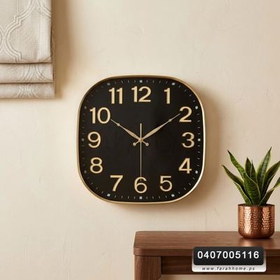 ساعة حائط لون اسود ارقام واطار ذهبي 30 سم مربع