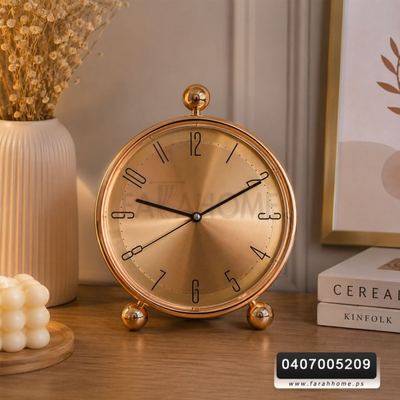 ساعة دائرية بلاستيك لون برونزي  قاعدة كرة 28سم
