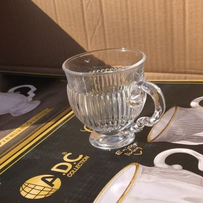 طقم كاسات شكل بطه شفاف محزز سادة من الاعلى مع يد وقاعدة 12 قطعة
