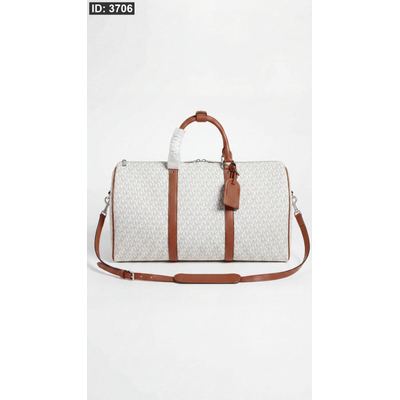 شنطة سفرية - Micheal Kors / مقاس 50 CM شامل ايد