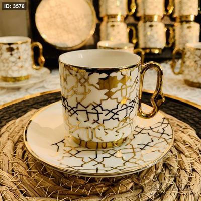 طقم ١٢ فنجان قهوة بورسلان مذهب ومنقوش