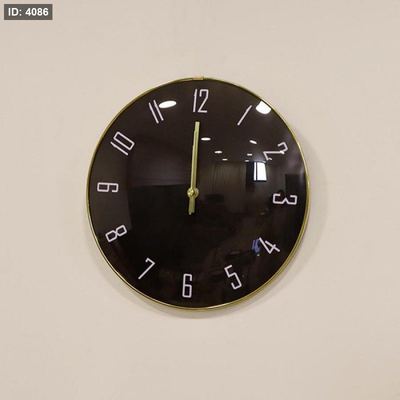 ساعة حائط بلاستك اسود مدور اطار ذهبي BL187/2 =÷خ