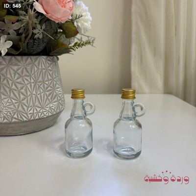 علب زجاج فاضية غطاء دهبي لف