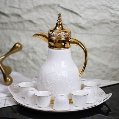 طقم دلة ثيرموس قهوة + صينية + فناجين بورسلان ابيض مرسم وردة عدد 12 فنجان - ثيرموس رأس مزخرف ويد ذهبي
